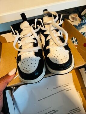 Jordan Kids Black and White High-Top Sneakers